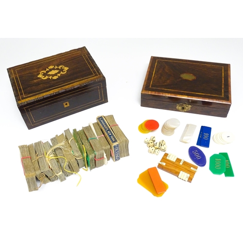 1176A - Toys: Two 20thC boxes with inlaid decoration containing assorted gaming components to include mother... 