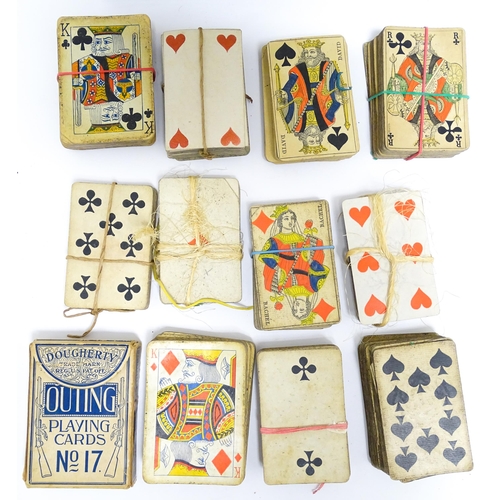 1176A - Toys: Two 20thC boxes with inlaid decoration containing assorted gaming components to include mother... 