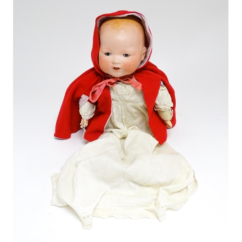 1183 - Toy: A 20thC Armand Marseille doll with bisque head, blinking eyes, painted detail, and composite ha... 