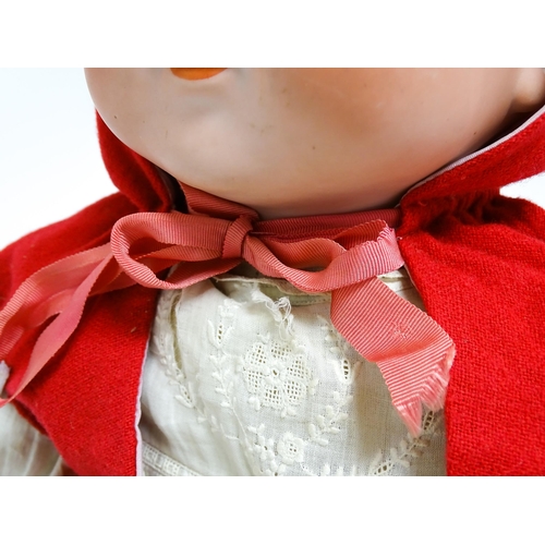 1183 - Toy: A 20thC Armand Marseille doll with bisque head, blinking eyes, painted detail, and composite ha... 