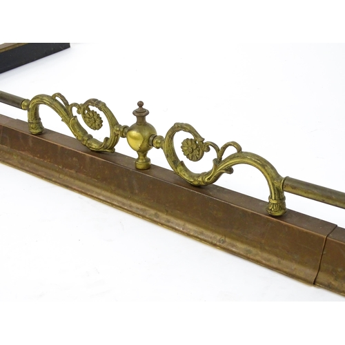 1586 - A 19thC brass fire fender of adjustable length.  52