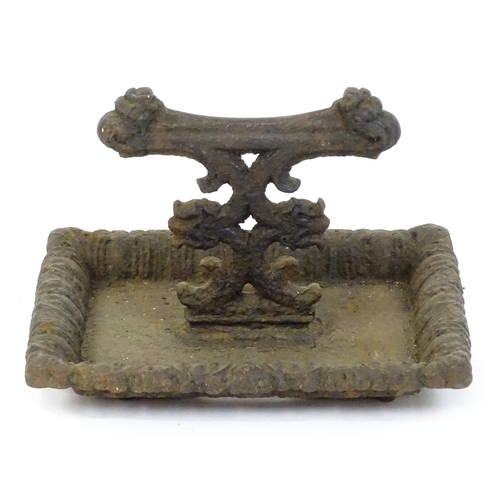 1589 - A Victorian cast iron boot scraper in the style of Coalbrookdale, the tray base supporting a short s... 