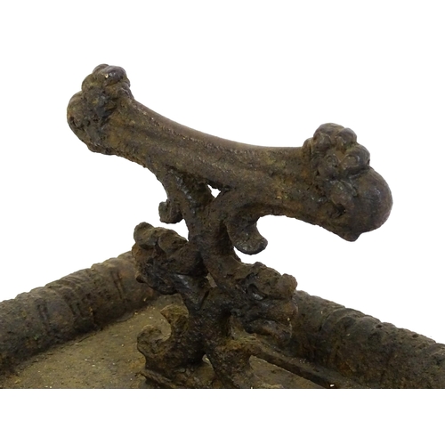 1589 - A Victorian cast iron boot scraper in the style of Coalbrookdale, the tray base supporting a short s... 