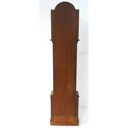 1643 - A 19thC mahogany 8-day longcase clock with arch shaped hood, the painted dial with Roman numerals, s... 