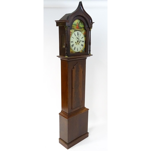 1643 - A 19thC mahogany 8-day longcase clock with arch shaped hood, the painted dial with Roman numerals, s... 