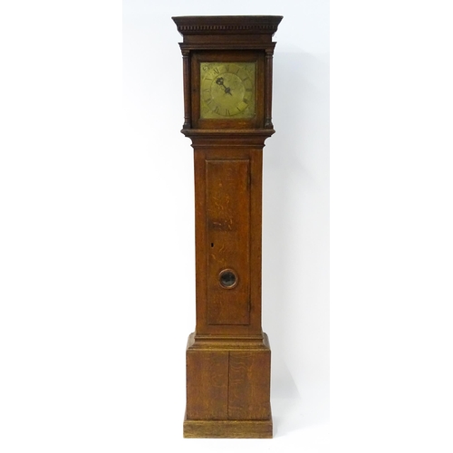 1644 - An oak cased 30 hour longcase clock striking on a bell, the brass dial with engraved floral decorati... 