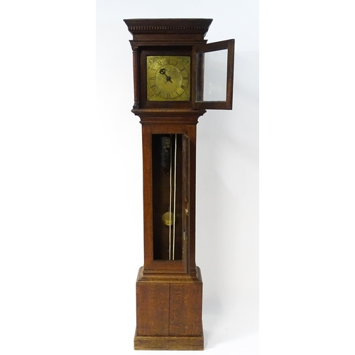 1644 - An oak cased 30 hour longcase clock striking on a bell, the brass dial with engraved floral decorati... 