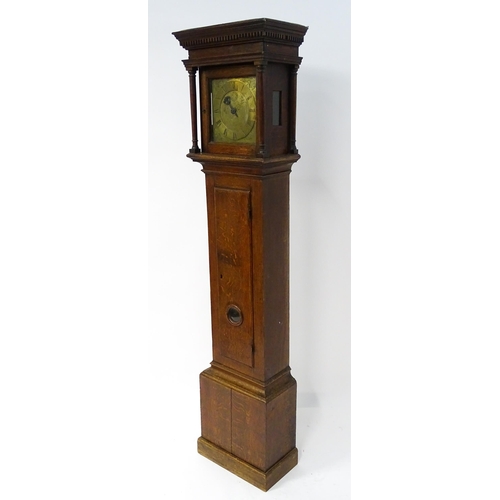 1644 - An oak cased 30 hour longcase clock striking on a bell, the brass dial with engraved floral decorati... 