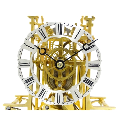 1649 - A Victorian brass skeleton clock, with fusee movement, silvered chapter ring  with Roman numerals an... 