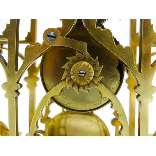 1649 - A Victorian brass skeleton clock, with fusee movement, silvered chapter ring  with Roman numerals an... 