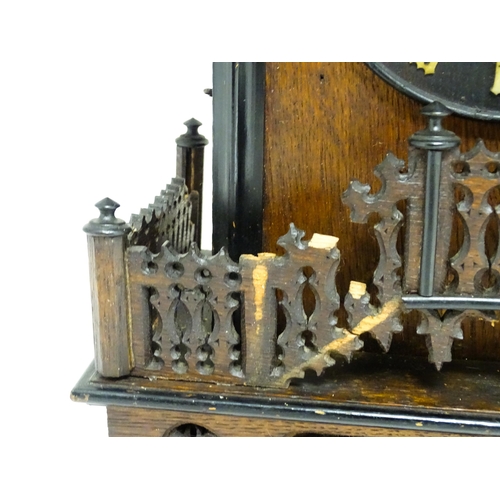 1650A - A 20thC oak cased Black Forest cuckoo clock. Approx 20 1/2