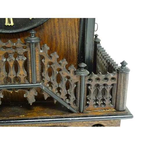 1650A - A 20thC oak cased Black Forest cuckoo clock. Approx 20 1/2