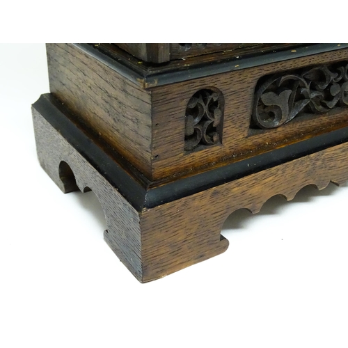 1650A - A 20thC oak cased Black Forest cuckoo clock. Approx 20 1/2