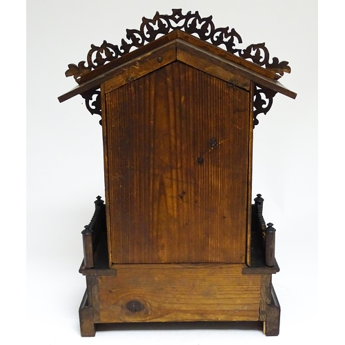 1650A - A 20thC oak cased Black Forest cuckoo clock. Approx 20 1/2