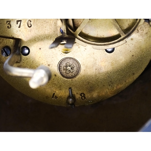 1655 - A French slate and marble cased mantle clock with white enamel dial with Roman chapter ring and 8-da... 