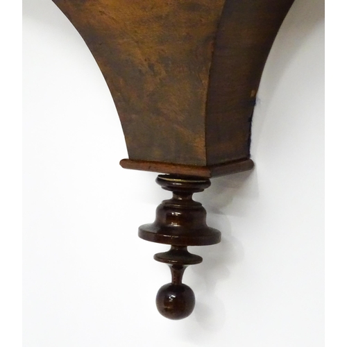 1656 - A Victorian 8-day wall clock, the walnut veneered case with twist columns surmounted by a cross form... 