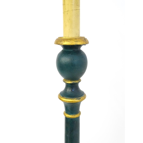 1668 - A turned wooden standard lamp with painted teal and gilt finish. Approx. 62