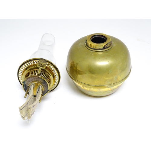 1669 - An Art Nouveau adjustable oil lamp with glass shade. Approx. 72 1/2