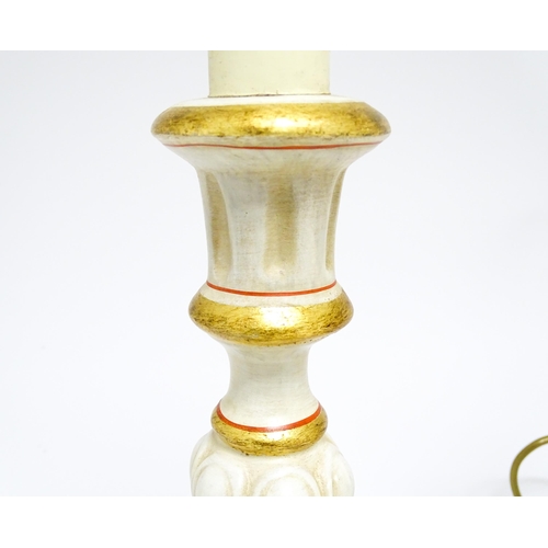 1670 - A pair of 20thC table lamps of candlestick form with gilt, cream and red detail. Approx. 19