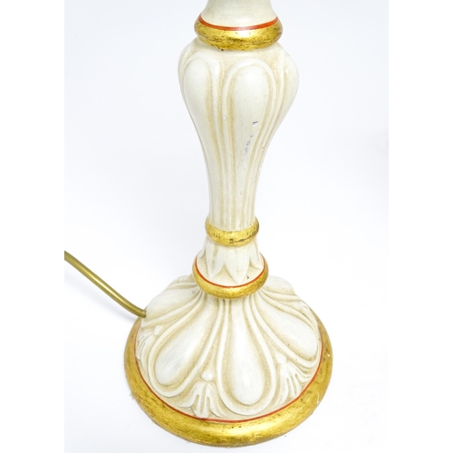 1670 - A pair of 20thC table lamps of candlestick form with gilt, cream and red detail. Approx. 19