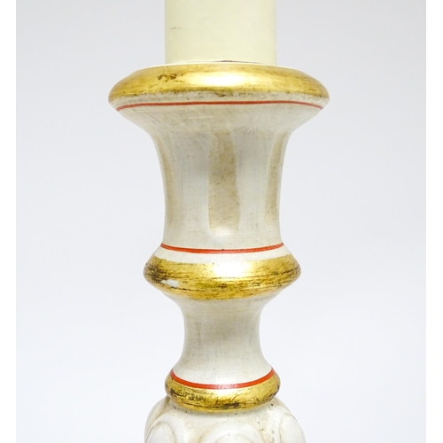 1670 - A pair of 20thC table lamps of candlestick form with gilt, cream and red detail. Approx. 19