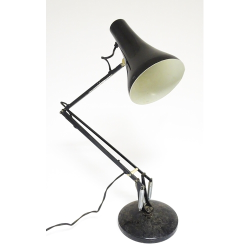 1673 - A vintage black angle poise style lamp.