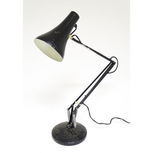 1673 - A vintage black angle poise style lamp.