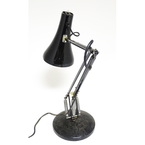 1673 - A vintage black angle poise style lamp.