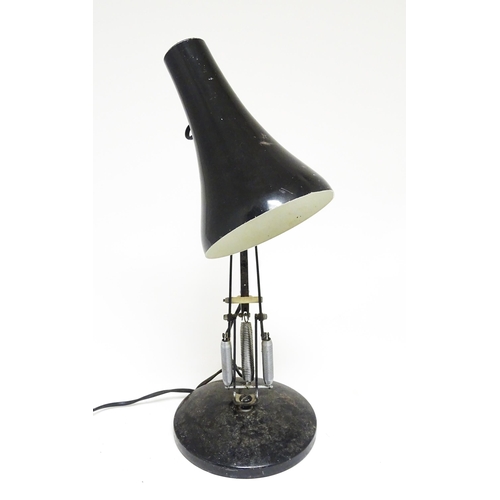 1673 - A vintage black angle poise style lamp.