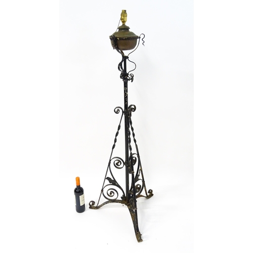 1677 - An Art Nouveau telescopic standard lamp with floral and scroll detail. Approx. 58