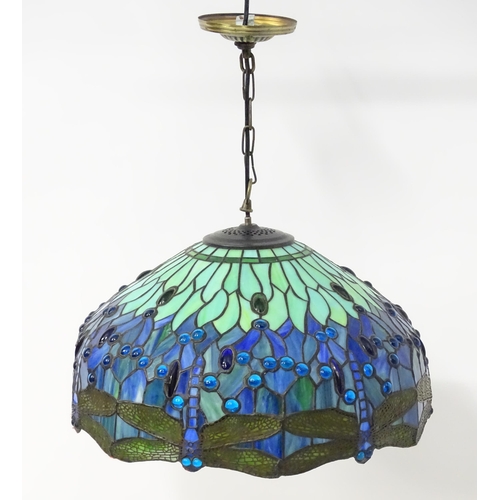 1703 - A Tiffany style pendant light with dragonfly and glass cabochon detail. Approx. 20