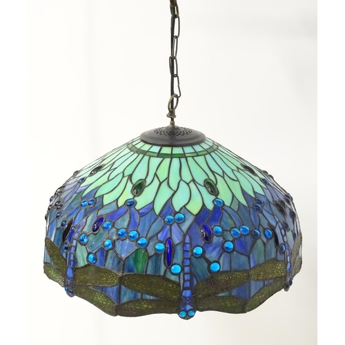 1703 - A Tiffany style pendant light with dragonfly and glass cabochon detail. Approx. 20