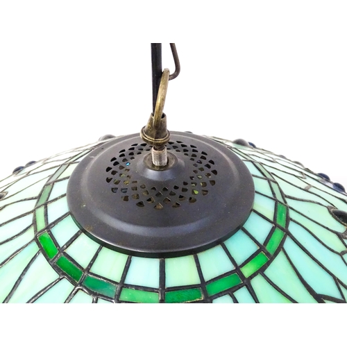 1703 - A Tiffany style pendant light with dragonfly and glass cabochon detail. Approx. 20