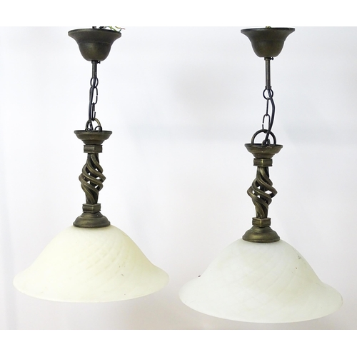 1708 - A pair of late 20thC pendant lights with frosted glass shades. Approx. 14