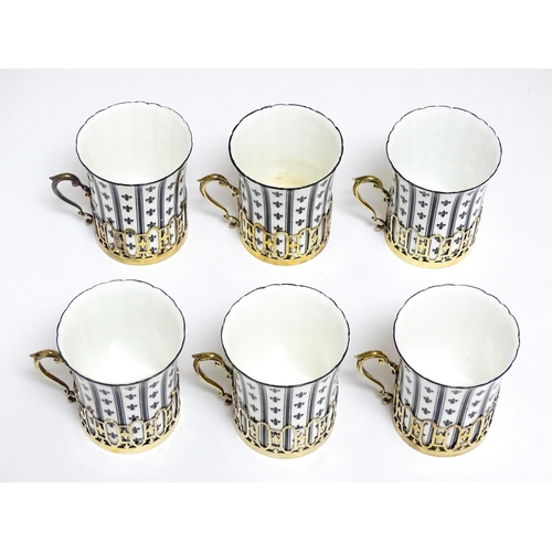 617 - An early 20thC Royal Worcester set of six coffee cups and saucers with black and white decoration, w... 