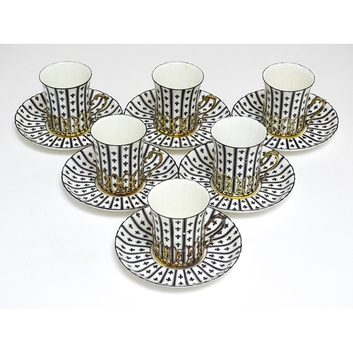 617 - An early 20thC Royal Worcester set of six coffee cups and saucers with black and white decoration, w... 