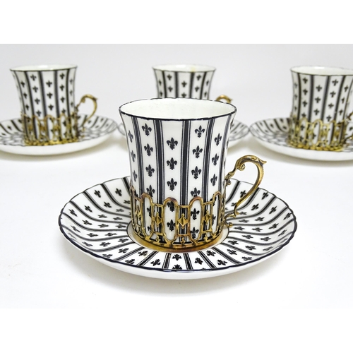 617 - An early 20thC Royal Worcester set of six coffee cups and saucers with black and white decoration, w... 