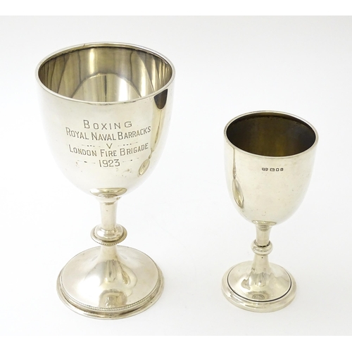 620 - A silver trophy cup of goblet form hallmarked London 1925 maker Robert Pringle & Sons. Approx 5 1/4