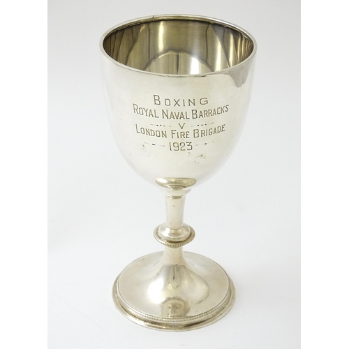 620 - A silver trophy cup of goblet form hallmarked London 1925 maker Robert Pringle & Sons. Approx 5 1/4