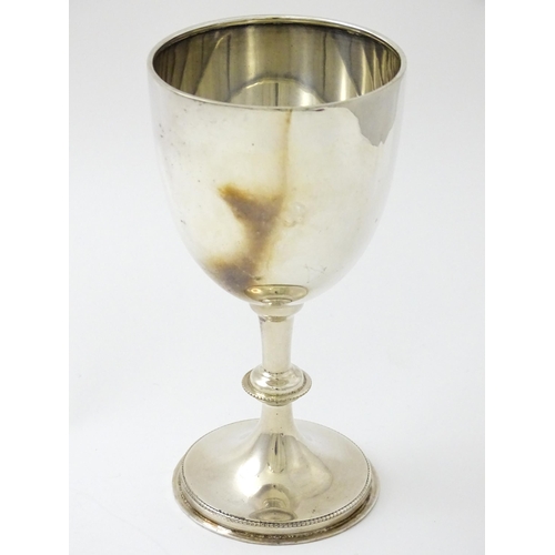 620 - A silver trophy cup of goblet form hallmarked London 1925 maker Robert Pringle & Sons. Approx 5 1/4