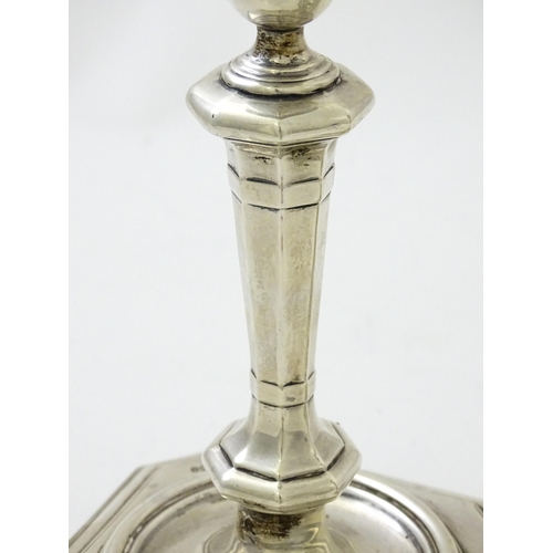 623 - A pair of silver candlesticks hallmarked Sheffield 1927 / 1928, maker James Dixon & Sons. Approx. 8