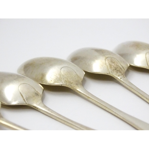 654 - A set of six silver seal top teaspoons hallmarked Sheffield 1924, maker Cooper Brothers & Sons Ltd. ... 