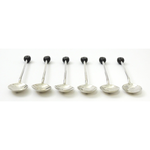 656 - A set of six silver coffee spoons with coffee bean finials, hallmarked Sheffield 1922, maker C. W. F... 