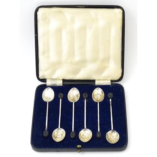 658 - A cased set of six silver coffee spoons with coffee bean finials hallmarked Sheffield 1964, maker Wa... 