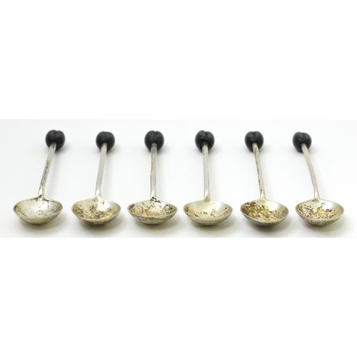 658 - A cased set of six silver coffee spoons with coffee bean finials hallmarked Sheffield 1964, maker Wa... 