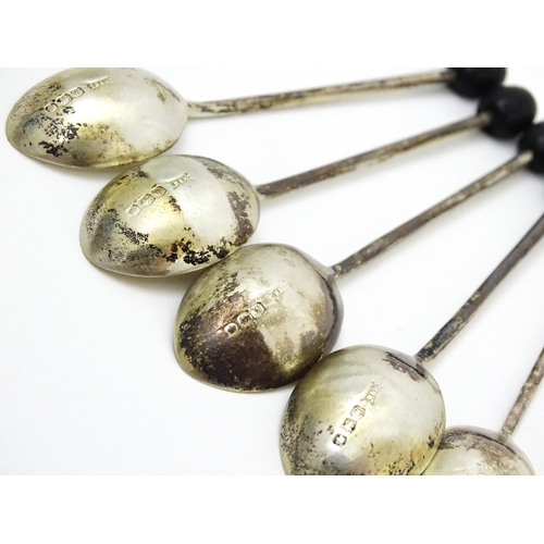 658 - A cased set of six silver coffee spoons with coffee bean finials hallmarked Sheffield 1964, maker Wa... 