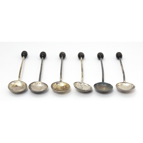 673 - A cased set of six silver coffee spoons with coffee bean finials, hallmarked Birmingham 1937, maker ... 