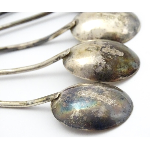 673 - A cased set of six silver coffee spoons with coffee bean finials, hallmarked Birmingham 1937, maker ... 