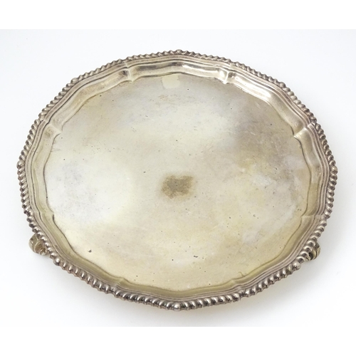 677 - A silver card tray / salver hallmarked London 1961, maker C. J. Vander Ltd. Approx. 8 1/4