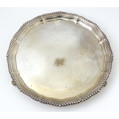 677 - A silver card tray / salver hallmarked London 1961, maker C. J. Vander Ltd. Approx. 8 1/4